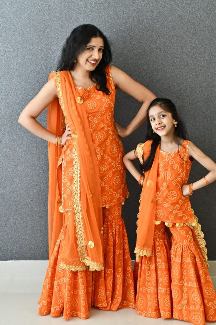Mother and daughter in matching dresses